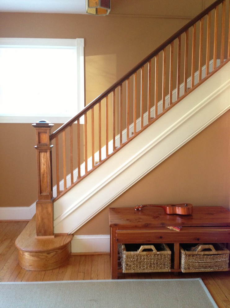 Example of a small classic wooden straight staircase design in DC Metro with wooden risers