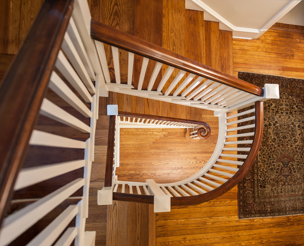 Inspiration for a timeless wooden l-shaped staircase remodel in Philadelphia with painted risers