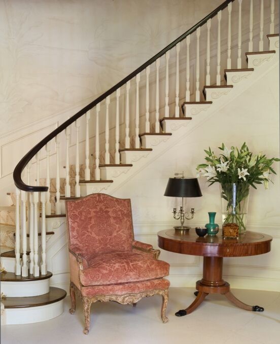 Example of a large classic wooden curved wood railing staircase design in San Francisco with wooden risers