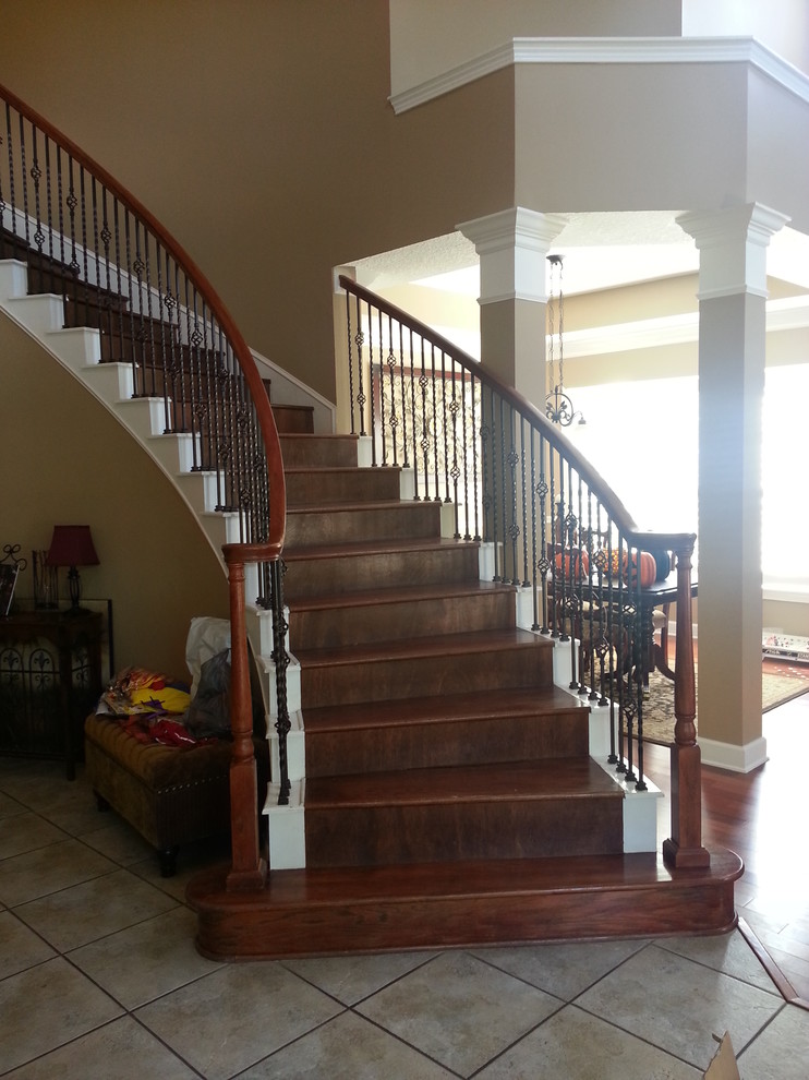 Replaced Wood with Wrought Iron Balusters Traditional Staircase