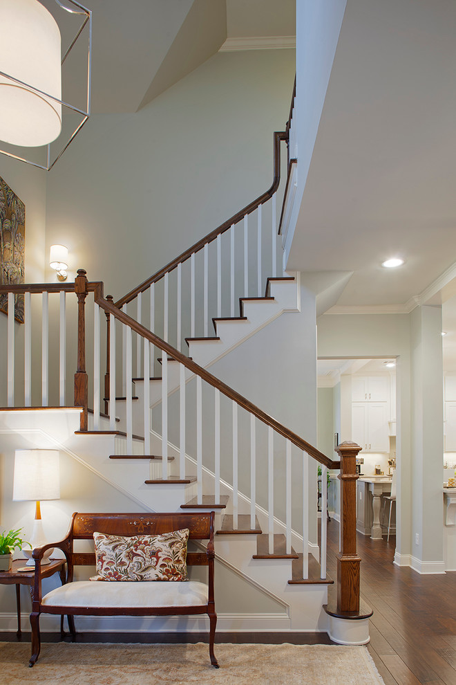 Mid-sized transitional wooden u-shaped staircase photo in Atlanta with wooden risers
