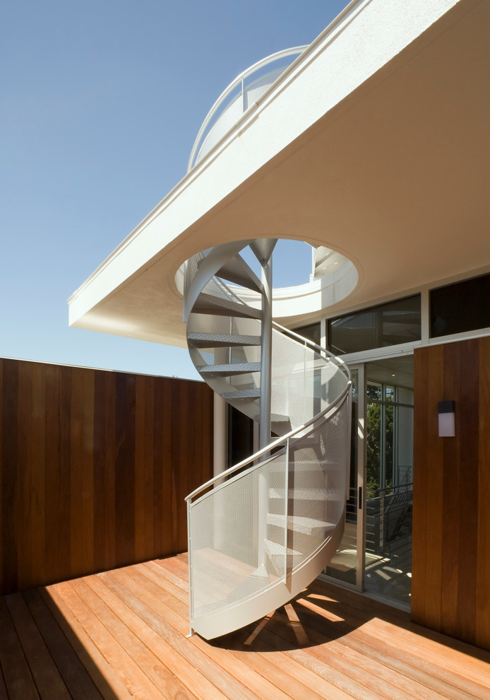 Inspiration for a midcentury staircase in Tampa with open risers.