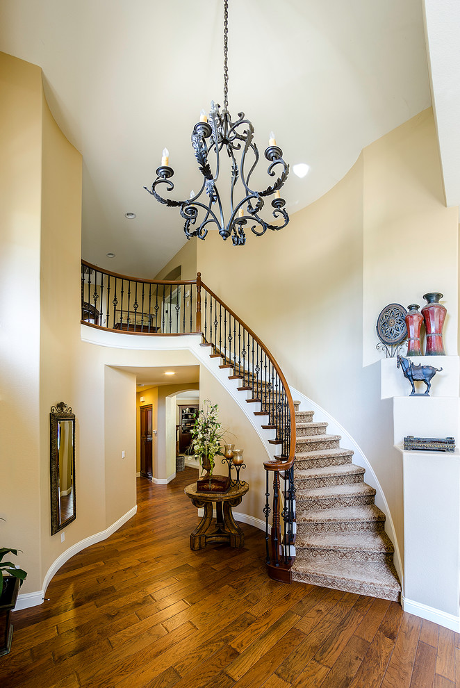 This is an example of a medium sized traditional staircase in Sacramento.