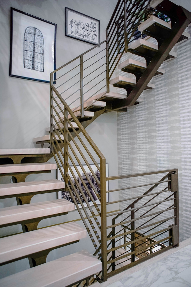 Staircase - contemporary floating cable railing staircase idea in Philadelphia