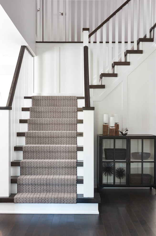 Mid-sized trendy wooden l-shaped wood railing staircase photo in Toronto with painted risers