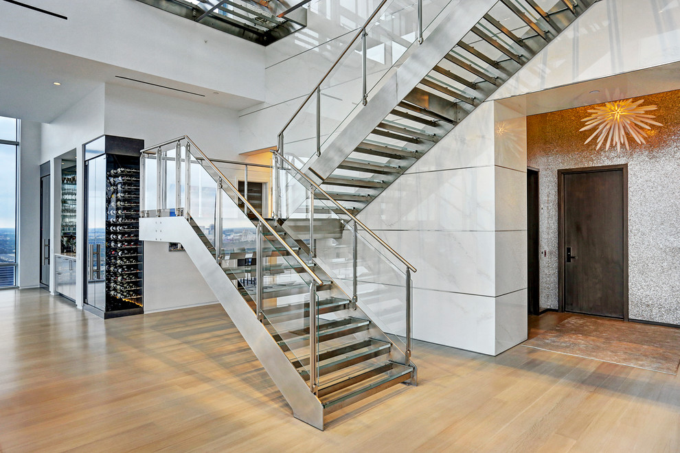 Staircase - large contemporary glass u-shaped open staircase idea in Houston