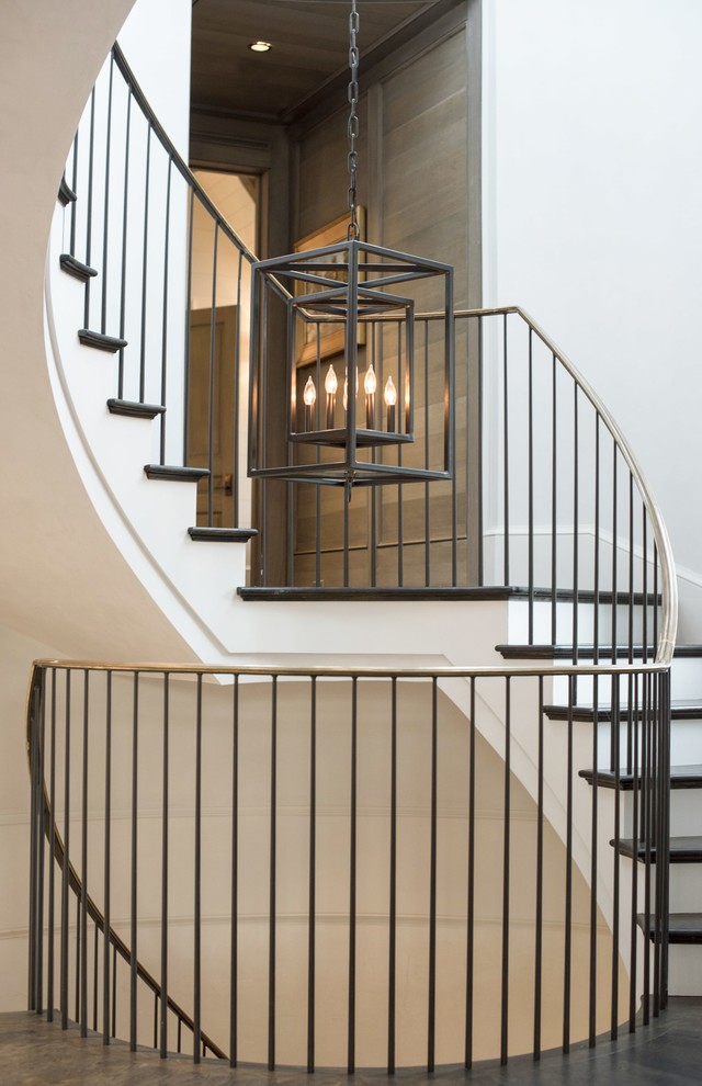 This is an example of a shabby-chic style staircase in Charleston.
