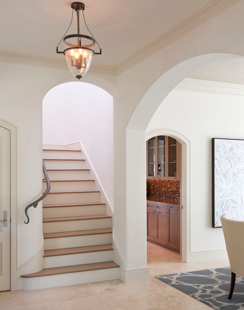 Example of a classic wooden u-shaped staircase design in Dallas with wooden risers