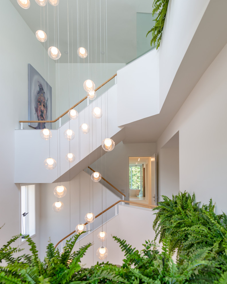 Design ideas for a contemporary u-shaped staircase in Toronto.