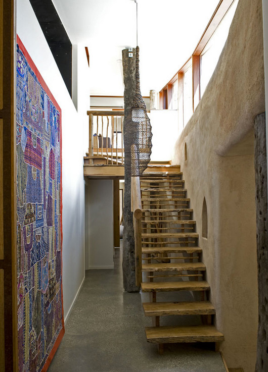 Idées déco pour un escalier flottant campagne de taille moyenne avec des marches en bois.