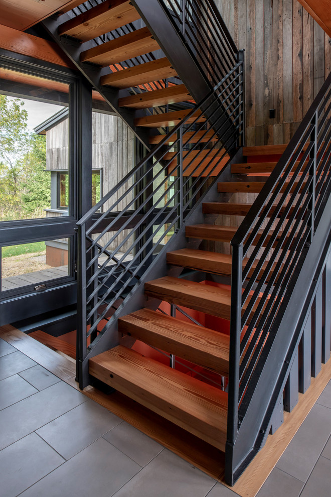 Example of a mountain style staircase design in Minneapolis
