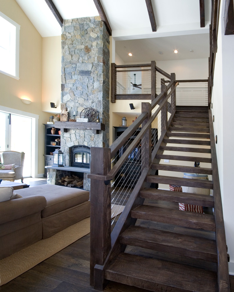 Exemple d'un grand escalier sans contremarche flottant nature avec des marches en bois.