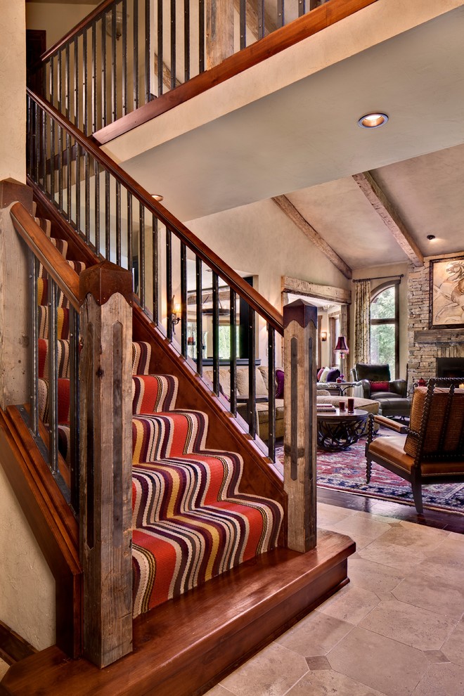 Staircase - rustic staircase idea in Milwaukee
