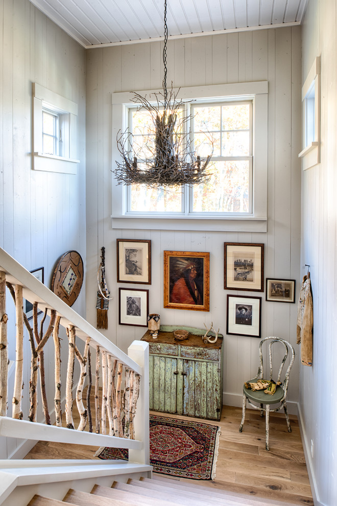 Example of a mountain style staircase design in Minneapolis