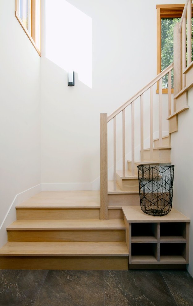 Mid-sized mountain style wooden u-shaped staircase photo in San Francisco with wooden risers