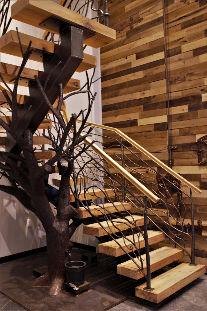 Große Rustikale Holztreppe in U-Form mit offenen Setzstufen und Mix-Geländer in Detroit