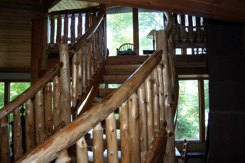 Photo of a medium sized contemporary painted wood straight staircase in Minneapolis with open risers.