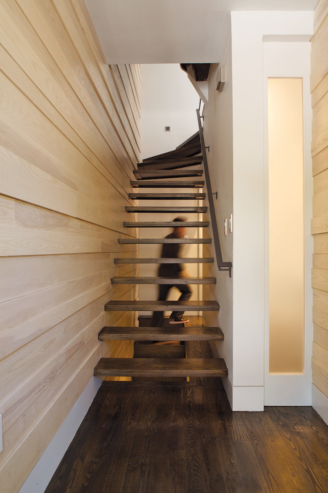 Contemporary staircase in Boston with open risers.