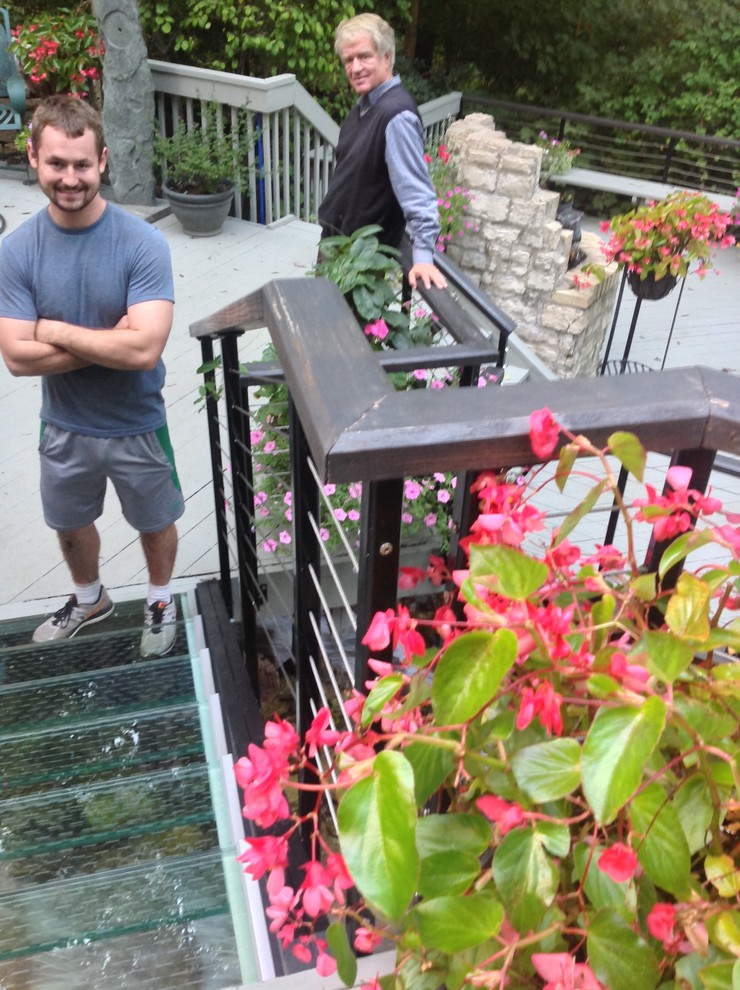 Safe glass staircase in a water feature in Columbus Ohio Traditional