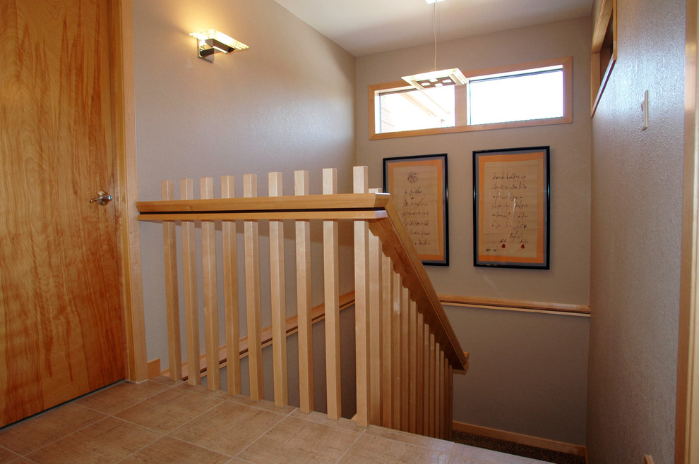 Design ideas for a medium sized bohemian u-shaped wood railing staircase in Other.