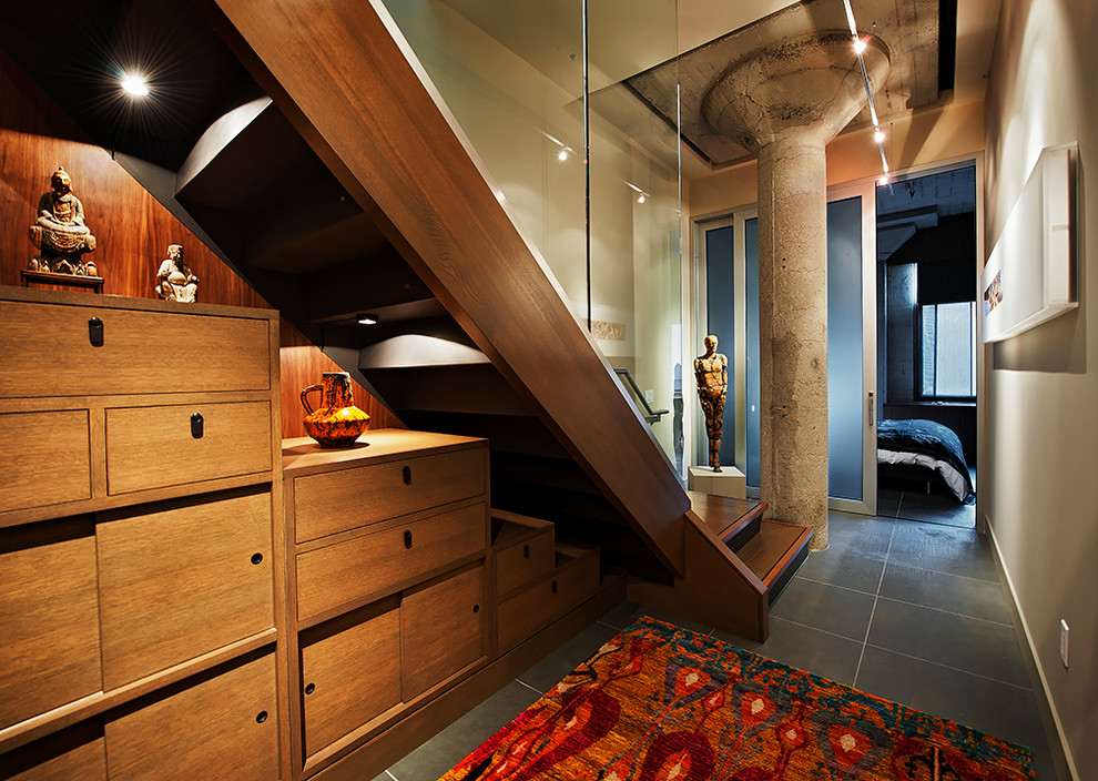 Inspiration for an industrial wooden staircase remodel in Seattle