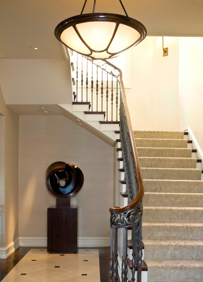 Inspiration for a large traditional wood u-shaped staircase in San Francisco with wood risers.