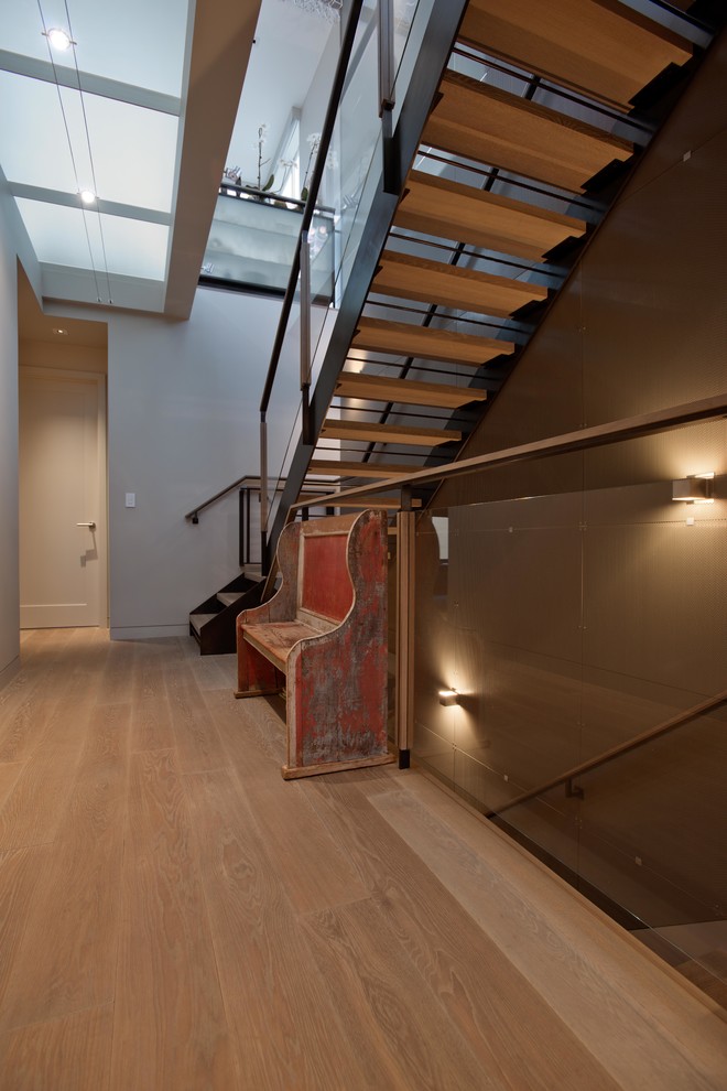 Ejemplo de escalera actual sin contrahuella con escalones de madera