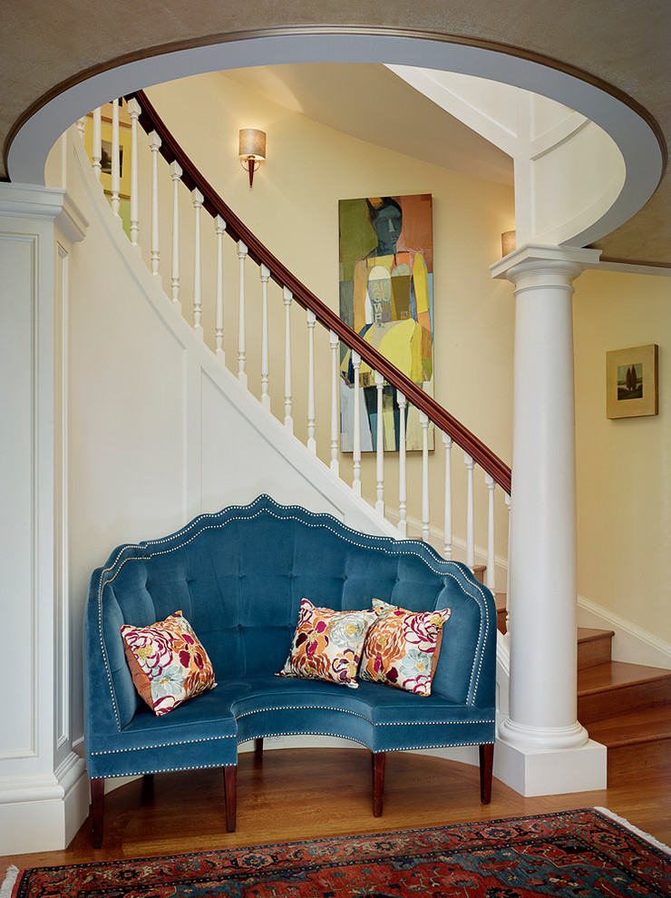 Inspiration for a traditional wood curved staircase in San Francisco with wood risers.