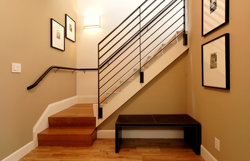 Inspiration for a contemporary wooden staircase remodel in San Francisco with wooden risers