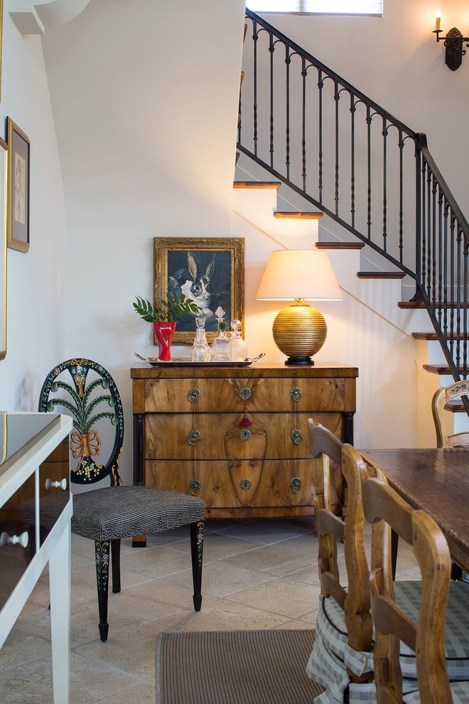 Example of a mid-sized tuscan u-shaped staircase design in Santa Barbara