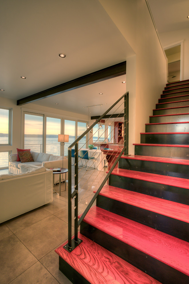 Staircase - mid-sized modern wooden straight metal railing staircase idea in Seattle with metal risers