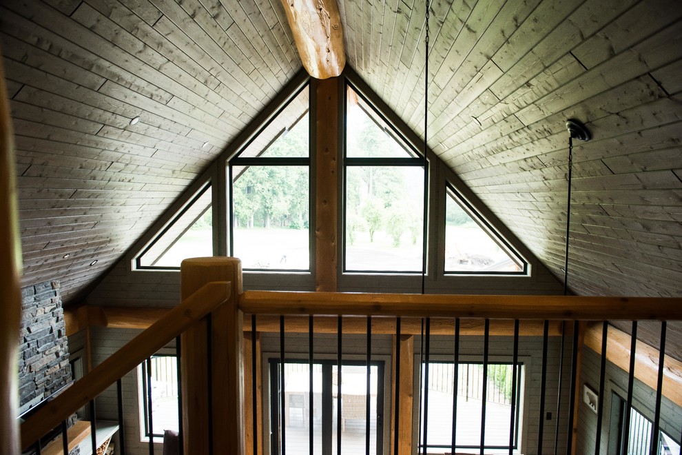 Источник вдохновения для домашнего уюта: угловая лестница среднего размера в стиле рустика с деревянными ступенями и деревянными перилами без подступенок