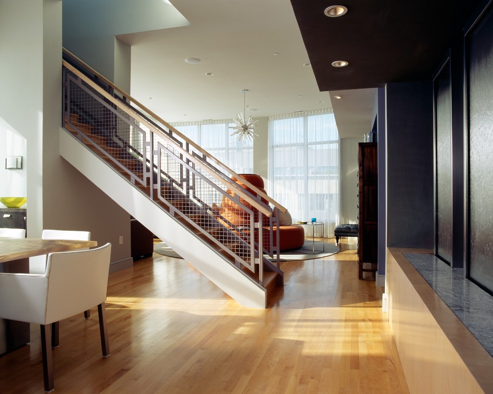 Inspiration for a contemporary wood straight staircase in Boston.
