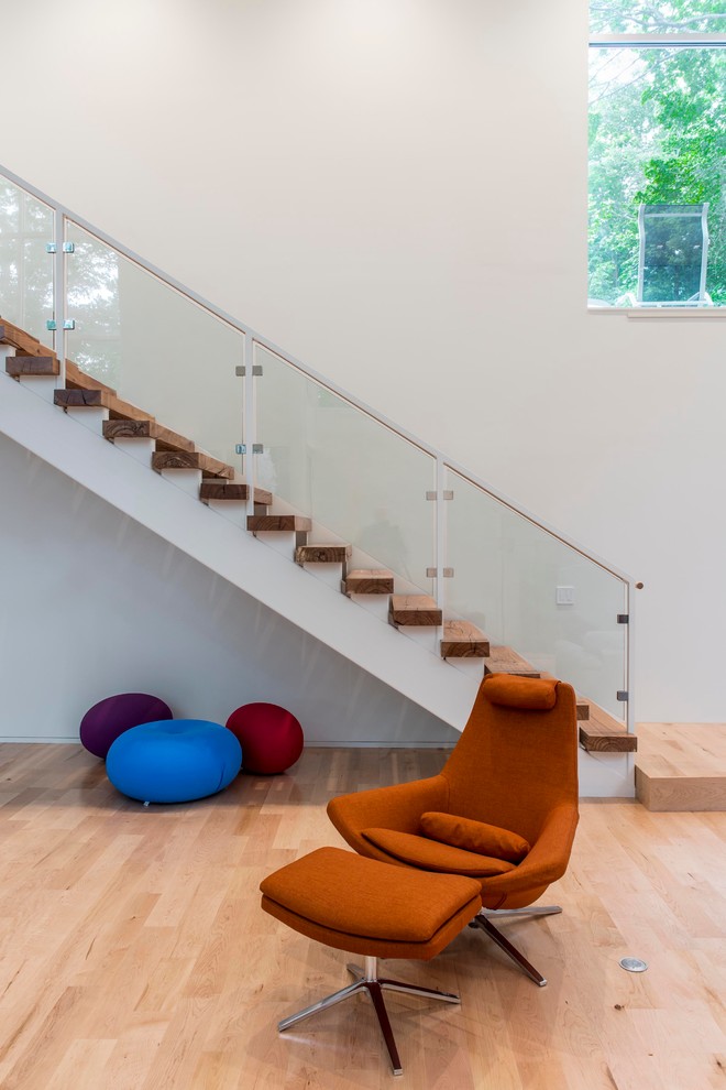 Inspiration for a contemporary wooden staircase remodel in Indianapolis