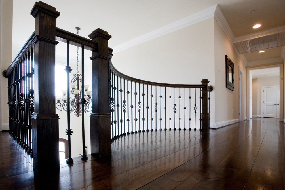 Example of a large classic wooden u-shaped mixed material railing staircase design in Baltimore with painted risers