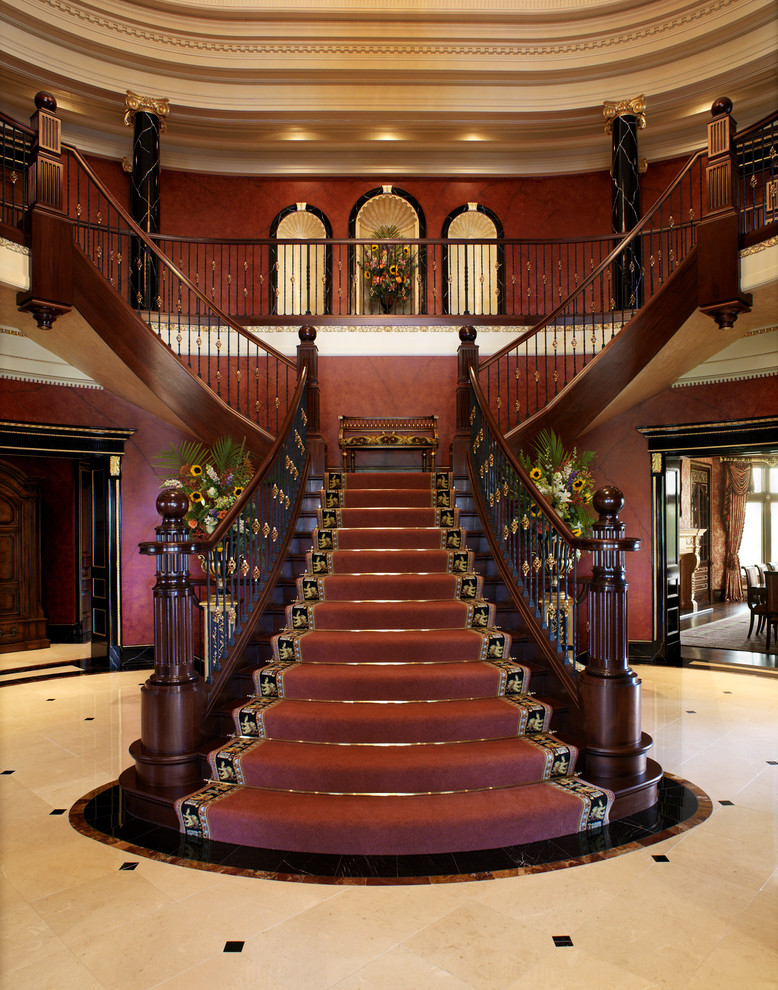 Large classic wood l-shaped staircase in Other with wood risers.