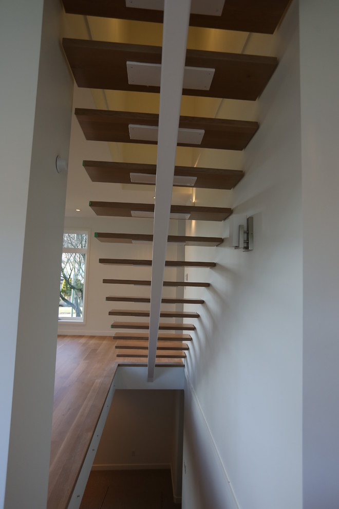 Staircase - contemporary staircase idea in Vancouver