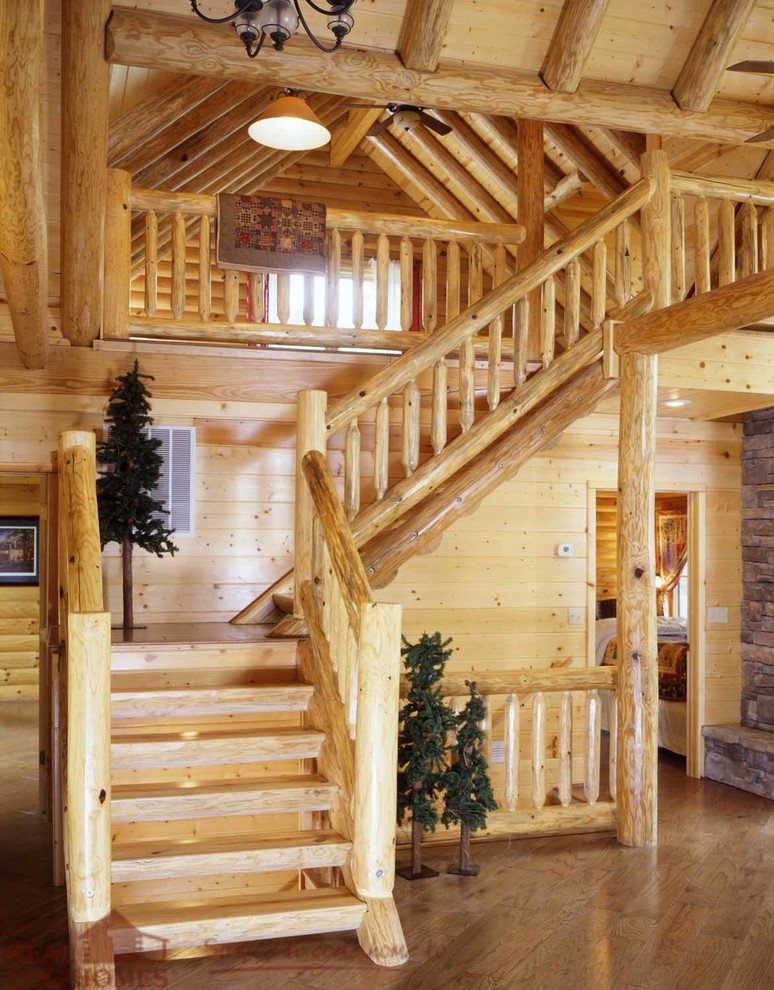 Staircase - rustic wooden l-shaped staircase idea in Burlington with wooden risers