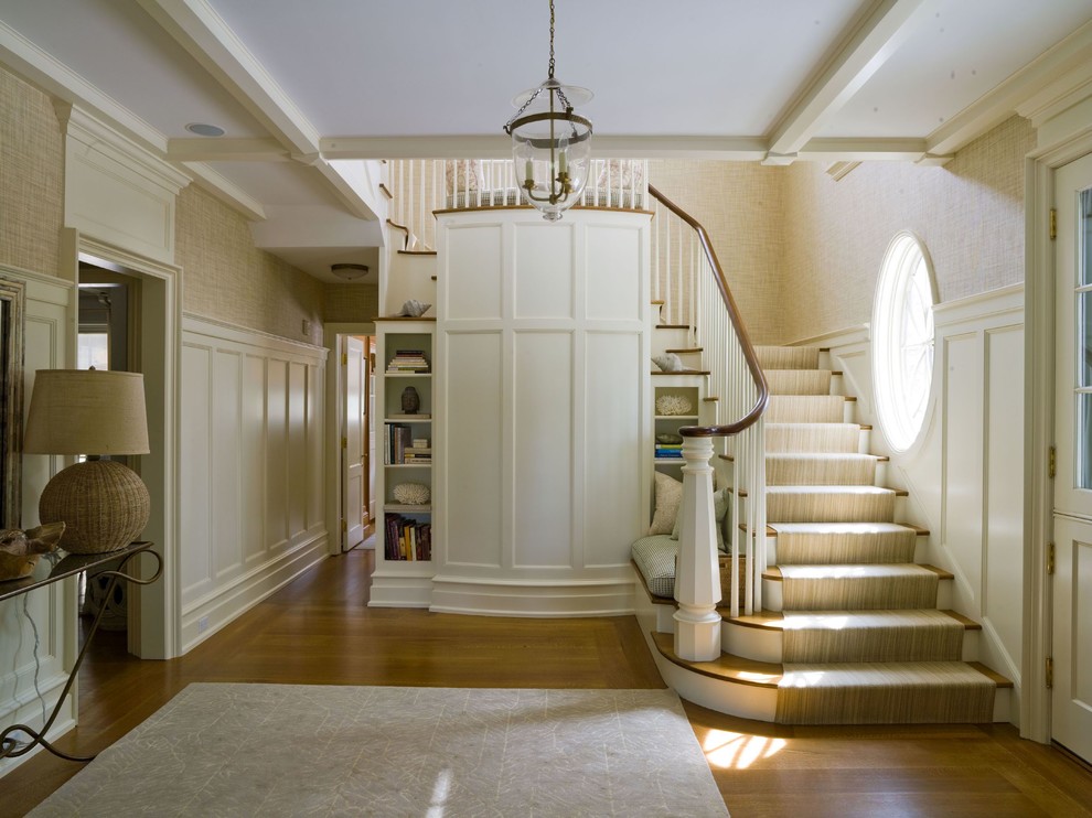 Photo of a victorian wood staircase in New York with feature lighting.