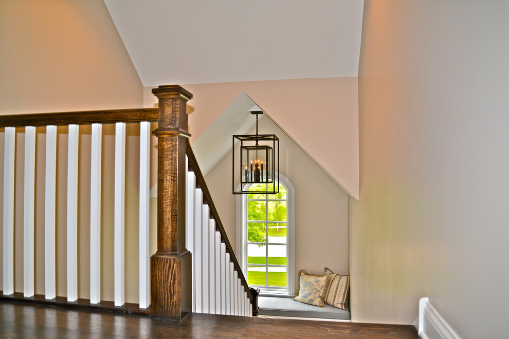 Inspiration for a victorian wood u-shaped staircase in Chicago with painted wood risers.