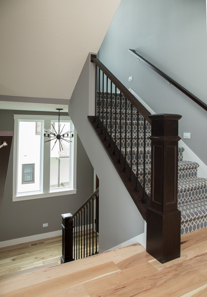 Example of a transitional staircase design in Minneapolis