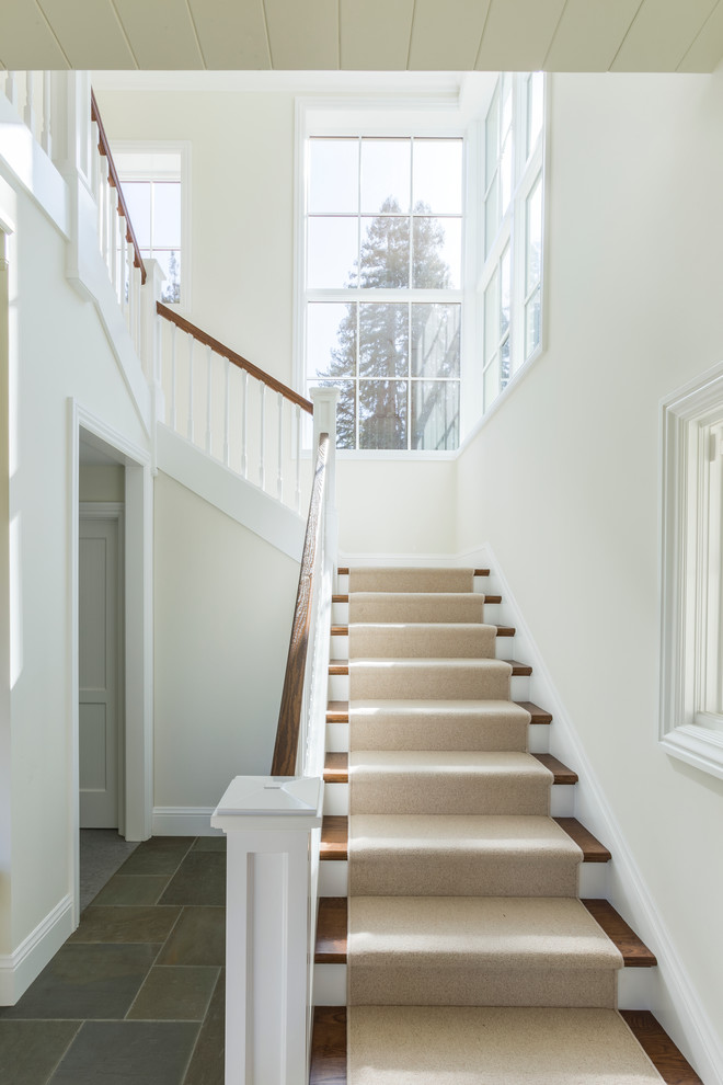 Staircase - large traditional wooden straight staircase idea in San Francisco with painted risers