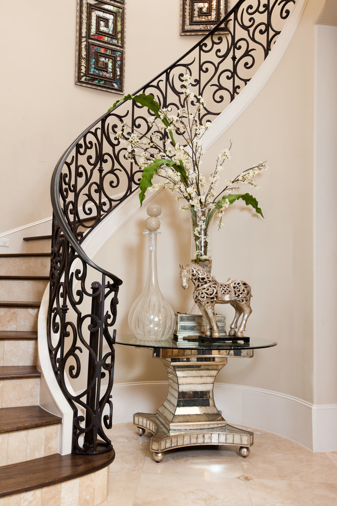 Inspiration for a mediterranean wood curved staircase in Houston.