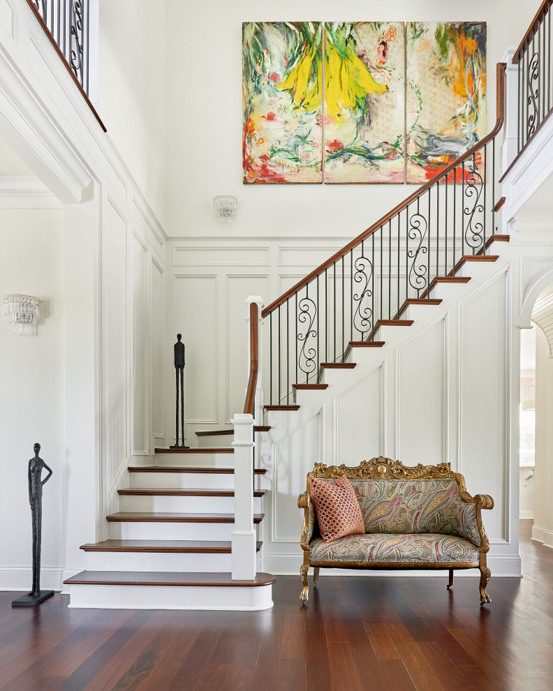 Design ideas for a classic wood l-shaped mixed railing staircase in Charleston with painted wood risers.