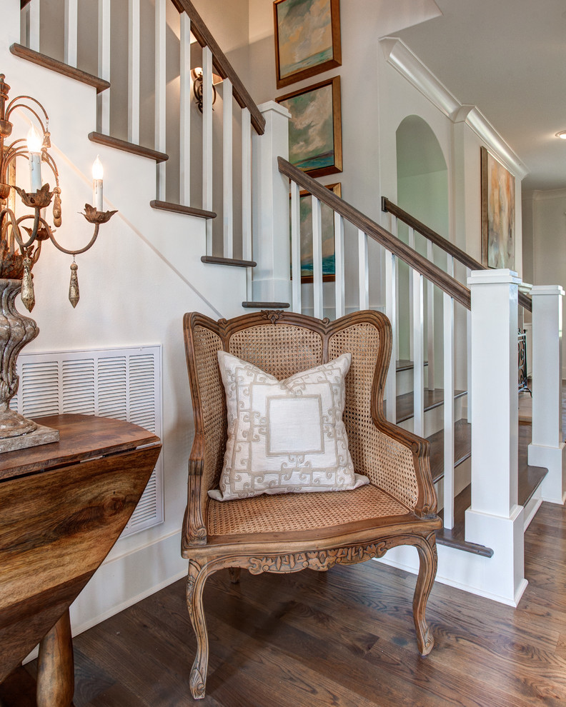 Mid-sized elegant wooden l-shaped staircase photo in Little Rock with painted risers