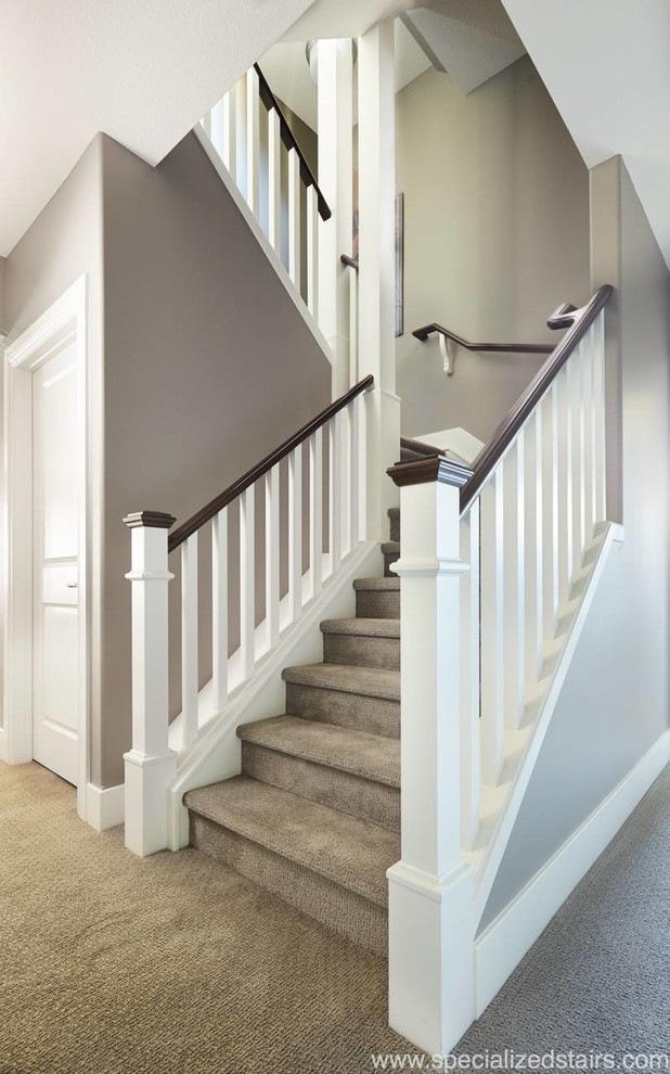Inspiration for a classic carpeted u-shaped wood railing staircase in Edmonton with carpeted risers.