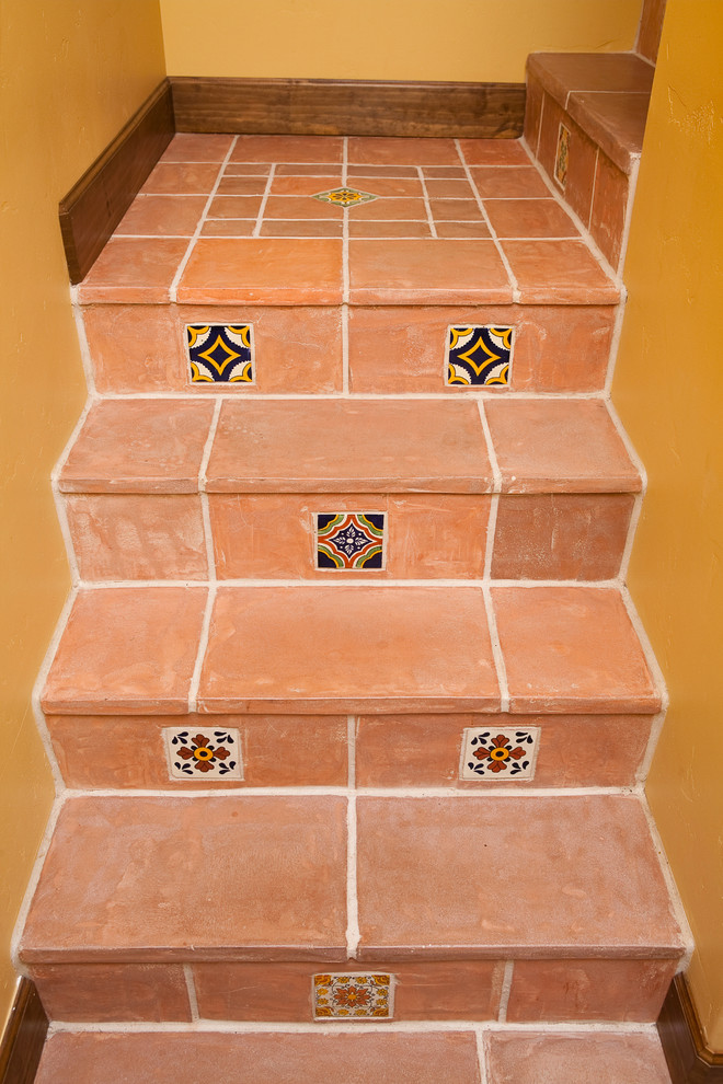 Inspiration for a small southwestern l-shaped staircase remodel in Santa Barbara