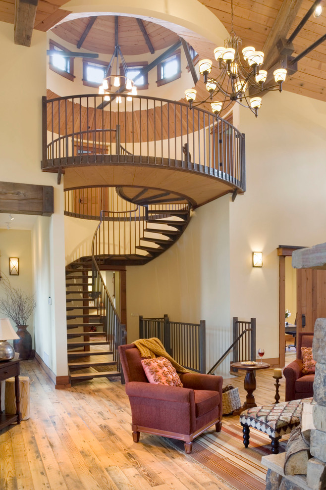 Design ideas for a large contemporary metal spiral staircase in Other with open risers.