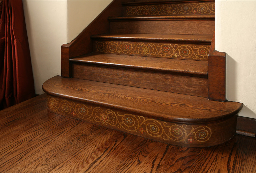 Inspiration for a mid-sized mediterranean wooden straight staircase remodel in Los Angeles with painted risers