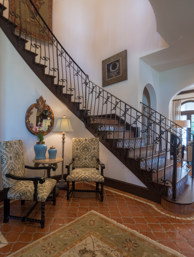Design ideas for a classic staircase in Houston with feature lighting.